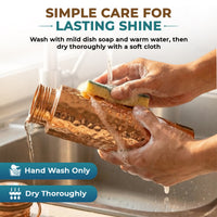 A hammered copper water bottle being washed by two hands in a sink, with soap foam, running water, and care instructions overlaid on the image stating hand wash only and dry thoroughly.