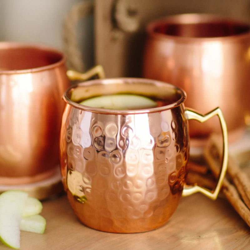 Solid copper Moscow Mule mug with apples and cinnamon 