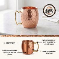A hammered copper Moscow mule mug with a gold-toned handle, shown on a light marble surface with a 'Solid Copper' badge. The lower half includes a labeled diagram explaining the mug's features: 16 oz capacity, pure solid copper, no plating or lining, and a welded handle.