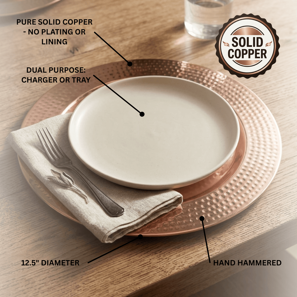 Copper charger plate with dinner plate on top. Overlaying text stating pure copper, charger or tray, hand hammered and 12.5" diameter.