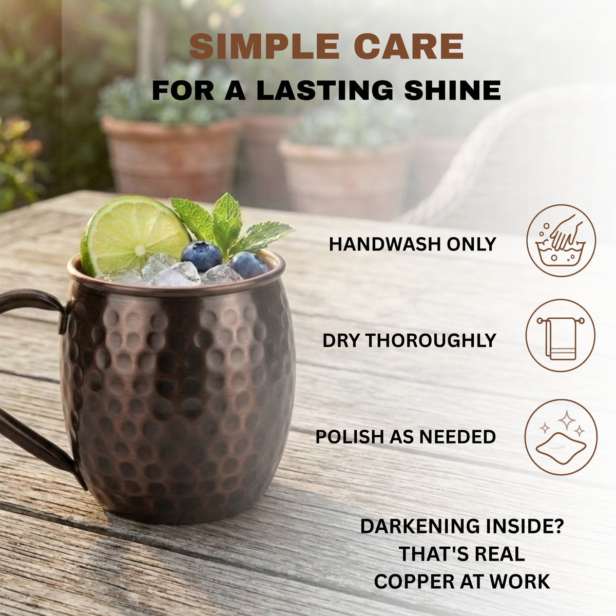 A hammered copper mug with dark lacquer finish filled with ice on a wooden table outdoors with text and care icons explaining how to maintain the mug's shine.