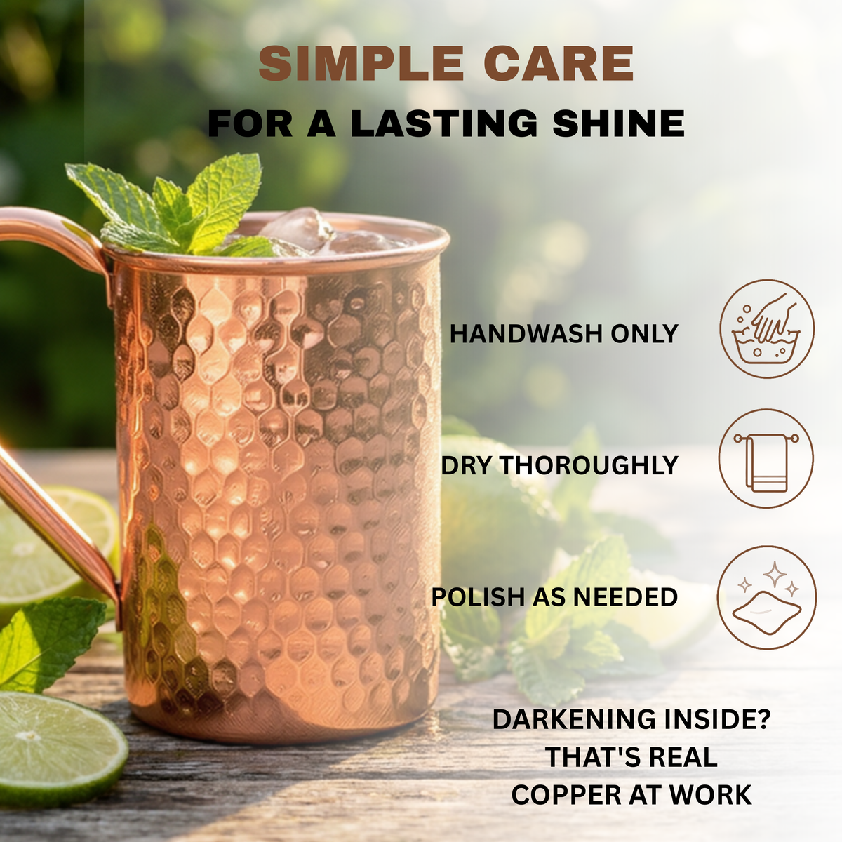 A hammered copper Moscow mule mug with a handle and mint garnish, shown on a wooden surface with lime slices and overlaid hand wash only, dry and polish.