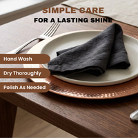 Copper charger plate with hammered detail. Information overlay stating hand wash, dry thoroughly and polish as needed.