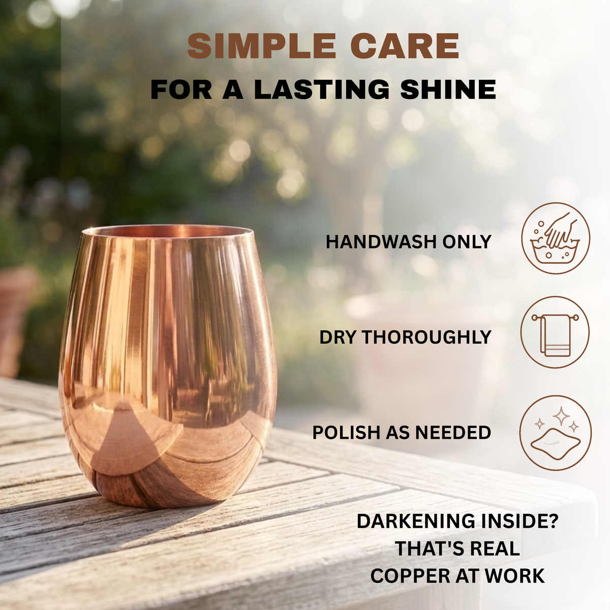 A copper wine cup sits on a wooden table outdoors with care instructions including 'HANDWASH ONLY,' 'DRY THOROUGHLY,' and 'POLISH AS NEEDED.